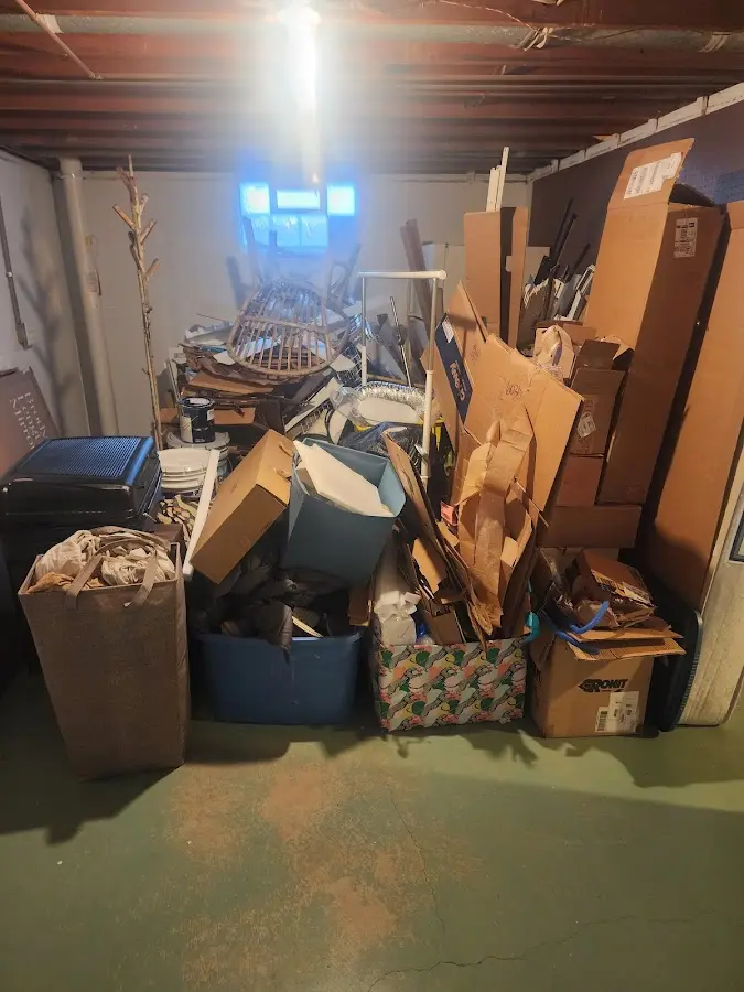 Roll-off dumpster container at job site for 4 Yard Dumpster Rental in Pennfield